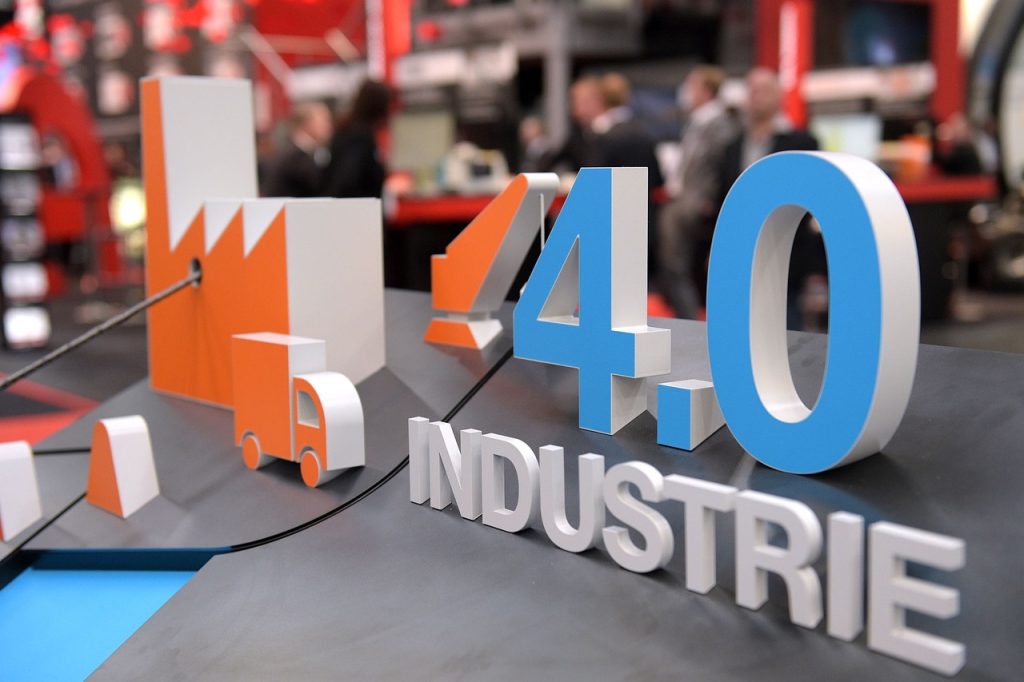Industrie avec un texte devant indiquant "industrie 4.0"